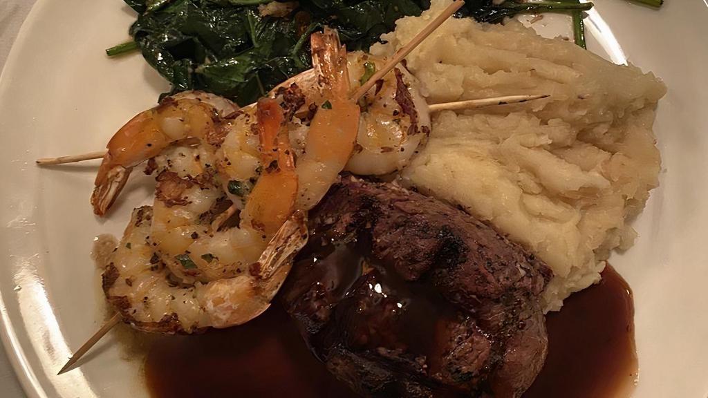 Beef And Reef · 8oz Marinated Certified Angus Beef Tenderloin, 5 Shrimp, Wilted Spinach, Garlic Mashed and Demi Glace.