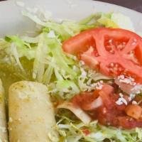 Enchiladas Verdes (3) · Chicken enchiladas topped with cheese, sour cream, and tomatillo sauce, served with rice and...