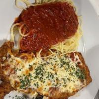 Chicken Parmigiana · Breaded chicken breast, topped with marinara sauce and mozzarella cheese.