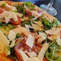 Italia Pizza · Arugula, prosciutto, cherry tomato and Parmesan cheese. White pizza, no tomato sauce, just m...