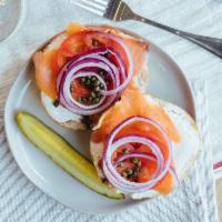 Lox & Bagel Sandwich · Smoked salmon with whipped cream cheese, tomato, red onion and capers on an everything bagel.