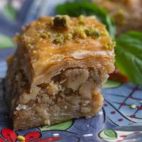 Baklava · Sheets of phylo filled with walnuts.