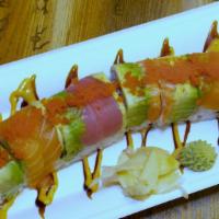 *Rainbow Roll · California roll topped with assorted raw fish, avocado and masago