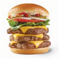 Dave'S Triple® · Three quarters of a pound* of fresh, never frozen beef, American cheese, crisp lettuce, toma...