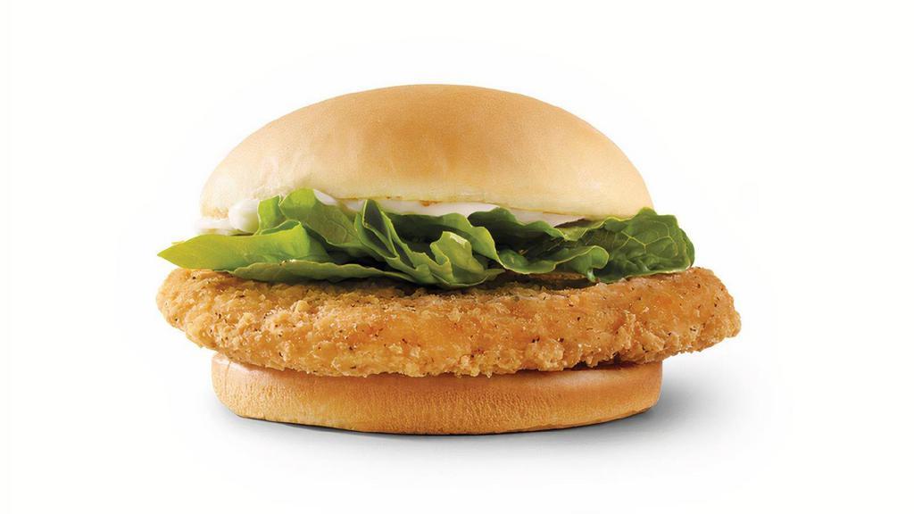 Crispy Chicken Sandwich · Juicy white meat, lightly breaded and seasoned, topped with crisp lettuce, and mayo. More than delicious, and just the right size.