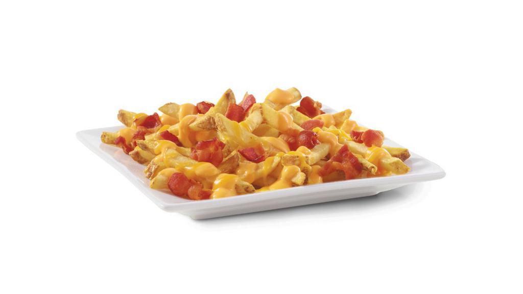 Baconator Fries · Our natural-cut, skin-on, sea-salted fries topped with warm, creamy cheese sauce, shredded cheddar, and crispy Applewood smoked bacon. The only fries worthy of the Baconator name.