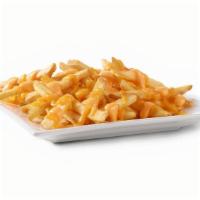 Cheese Fries · Our natural cut fries, smothered in a creamy cheese sauce..