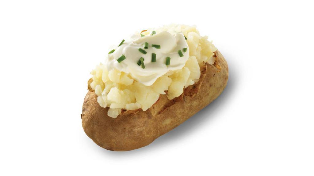 Sour Cream And Chive Baked Potato · A hot, fluffy potato topped with the classic combination of chives, and sour cream. It’s a side, it’s a meal, it’s a potato’s potato. Potato.