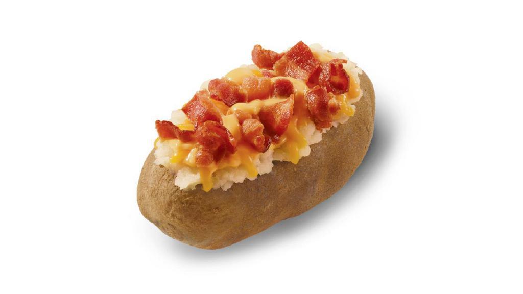 Bacon Cheese Baked Potato · Hot and fluffy potato topped with creamy cheese sauce, shredded cheese, and Applewood smoked bacon. Because nothing goes with a potato like cheese, more cheese, and also bacon.