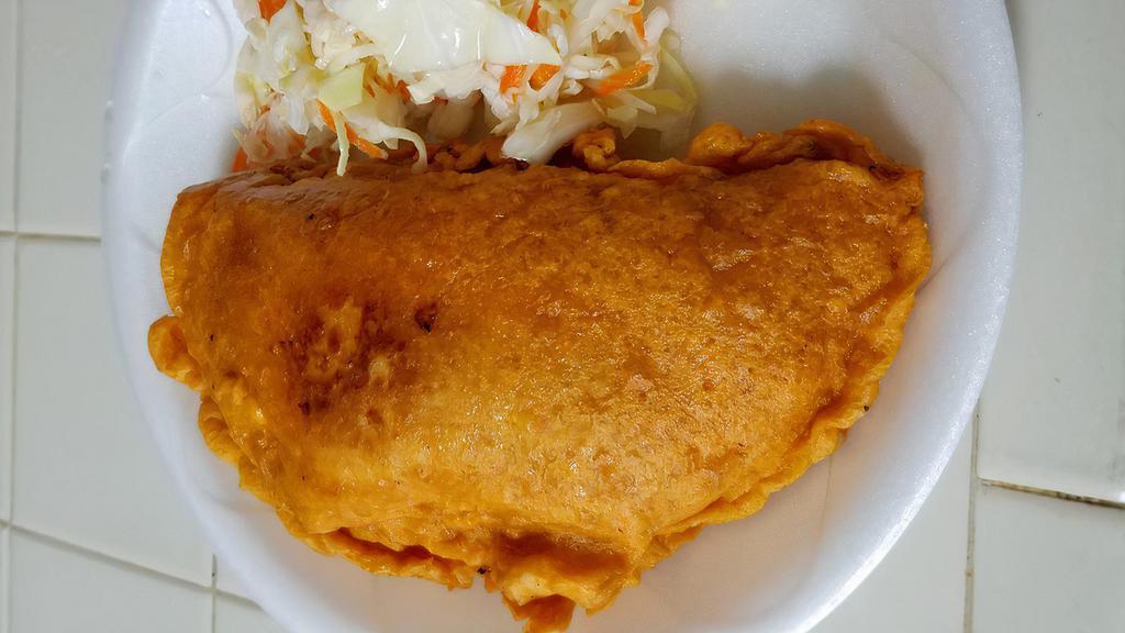 Enchilada (Fried Stuffed Tortilla) · Stuffed with Beef, Rice & Jalapeños. Served with coleslaw.