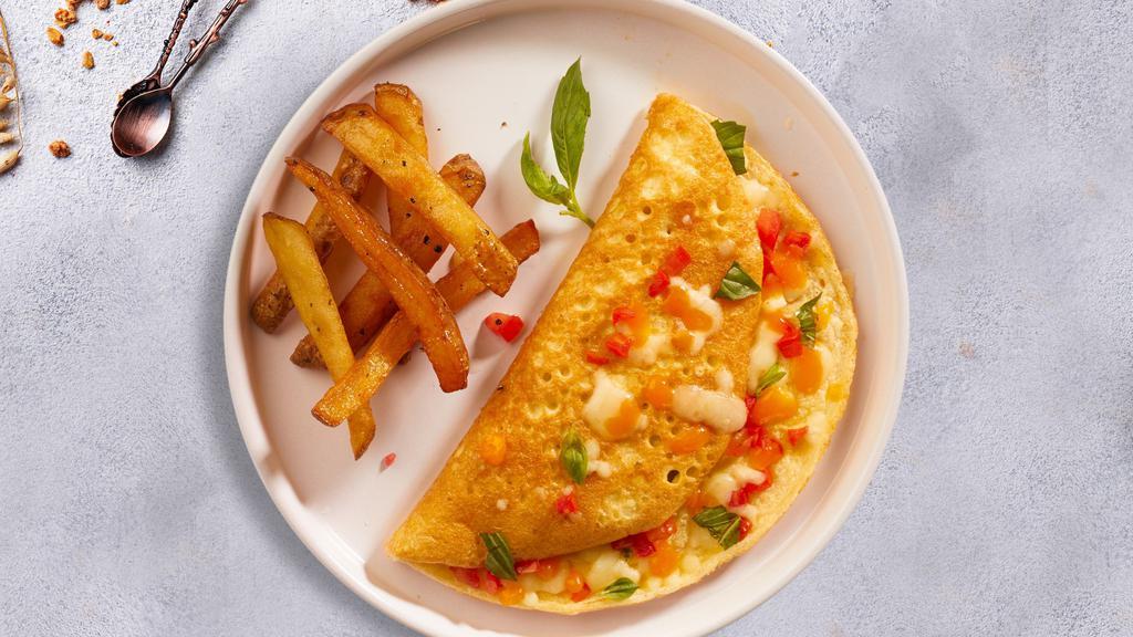 Mighty Meaty Omelette · Choice of meat and cheese. Large and fluffy three egg omelette served with your choice of side.