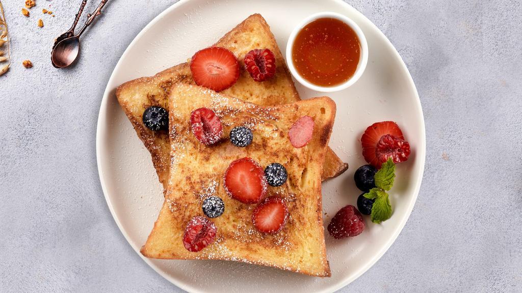 Pink Berry Cream French Toast · 2 slices of French Toast with strawberry cream cheese and topped with fresh strawberries.