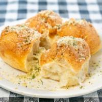 Garlic Rolls · Rolls topped with garlic and olive oil or butter, herb seasoning, baked to perfection.