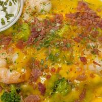 Jumbo Loaded  Shrimp Potato  · Loaded with broccoli cheese ,sour cream ,corn, sautéed garlic shrimp  with a  creamy buttere...