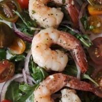 Gamberetti Romano · Fresh shrimps sautéed with onions, artichokes, white wine and fresh tomatoes puree.