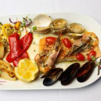 Salmone Della Casa · Salmon fillet with shrimp, mussels, clams, cherry tomatoes, and lemon white wine sauce.
