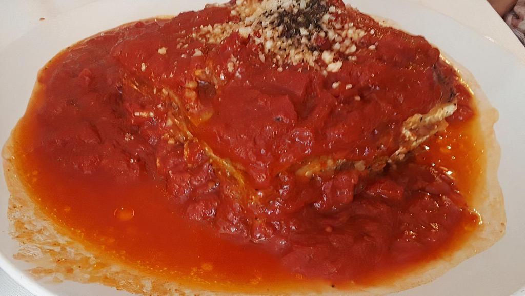Lasagna Di Carne · Layers of pasta with homemade bolognese and bechamel sauce, basil, mozzarella, and pecorino cheese.