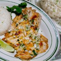 Grilled Chicken Breast · Chicken pallaird marinated, griddled, topped with onions and parsley. Served with white rice...