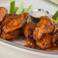 Jazzy Wings	 · Jumbo chicken wings lightly floured, seasoned and fried. Served with homemade cheddar bleu c...