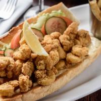 Crawfish Po-Boy	 · Hand-battered, golden fried, dressed and served overstuffed. Served with french fries