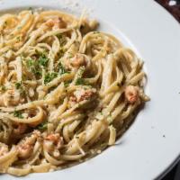 Crawfish Fettuccine	 · Crawfish sautéed in a light cream sauce with green onions, special seasonings and fettuccine