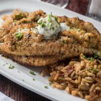 Crab Stuffed Catfish Bordelaise	 · Broiled catfish with lump crabmeat stuffing, served with Shrimp Creole rice and one side