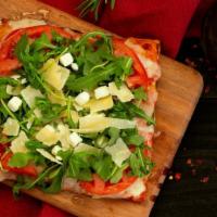 The Olympian - Slices Pizza · Tomato sauce, mozzarella, fresh tomatoes. After baking arugula, feta, parmesan, olive oil.