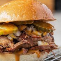 Pulled Perfect Pork · Classic, pulled and chopped pork BBQ on a toasted bun. Served with a side of pickles, onions...