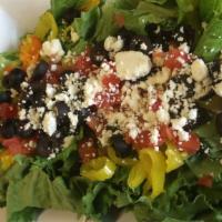 Small Greek Salad · Romaine, Tomatoes, Black Olives, Banana Peppers, & Feta Cheese