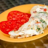 Greek Omelet · Spinach, tomato and feta.
