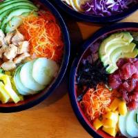 Poke Bowl · Pick one protein, five sides, tops and two sauces (max)
additional $3 per extra protein,
add...