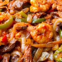 Fajitas Mixtas · our delicious fajitas are a mixture of the best meat with chicken and shrimp with onions and...