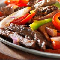 Fajitas De Res (Steak Fajitas ) · our delicious fajitas are a mixture of the best meat with onions and a variety of peppers ac...