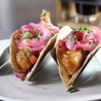 Baja-Style Fish Tacos · Vienna Red Lager-battered haddock, red cabbage. slaw, pickled onion, pico de gallo, chipotle...