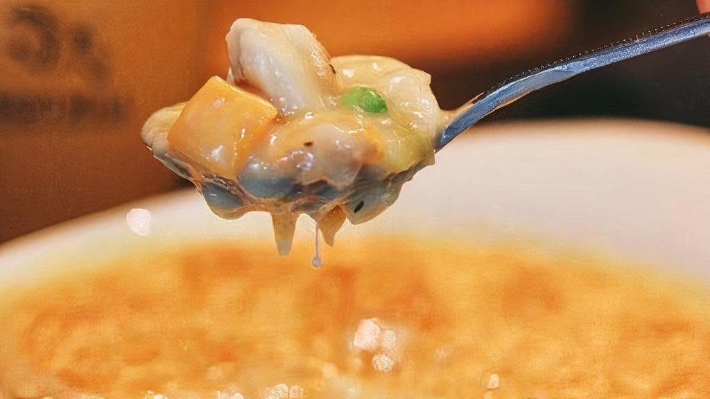 Chicken Pot Pie · tender chicken, butternut squash, yukon gold potatoes, sweet peas, carrots, onions, herbs simmered in a velvety sauce, flakey pastry top.