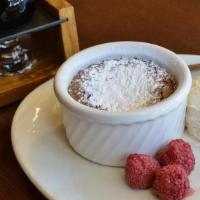 Warm Chocolate Molten Cake · vanilla ice cream, raspberries