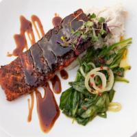 Blackened Salmon · 8 oz blackened salmon pan seared and brushed with clarified butter accompanied with garlic m...