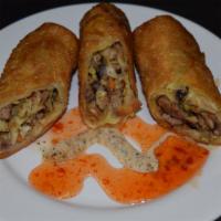 Southwest Chicken Egg Roll · 1 house made Southwest Chicken eggroll!  Served with choice of carribean ranch or sweet Thai...