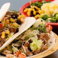 Tacos · 1 soft flour tortillas filled with your choice of protein, zesty black beans, Monterey jack ...