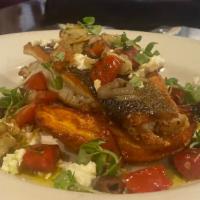 Mediterranean Branzino · Pan seared With Fresh Parsley Diced Tomatoes, Garlic, Shallots Olives, Red Onion Crumbled Fe...