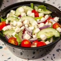Greek Salad · Romaine Lettuce, Cucumber, Red Onions, Black Olive, Grapes Tomatoes, Feta Cheese, Greek Dres...