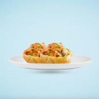 Loaded Potato Skin · Potatoes lightly dressed with olive oil and baked on a foil-lined baking sheet until skins a...