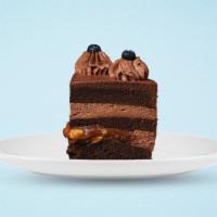 Rich Chocolate Cake · Rich chocolate cake slice.
