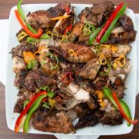 Jerk Chicken · ONE POUND JERK CHICKEN SERVED W/ BREAD