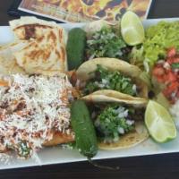 Bandeja Mexicana · Three Pieces Beef tacos, two Pieces fried tаcos, quesadilla, lettuce, guacamole, crema, salsa.