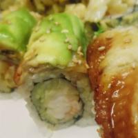 Black Dragon Roll · Shrimp tempura inside w. eel and avocado on top