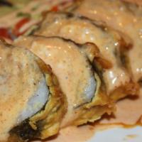 Diablo Roll · Tuna, salmon, krab, cream cheese, and scallions on top deep fried w. spicy shrimp sauce
