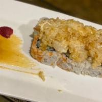 Volcano Roll · Baked cream cheese & scallop on top of a California roll