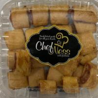 Raspberry Rugelach · Made by rolling a buttery, flaky dough around a sweet filling of raspberry fruit.