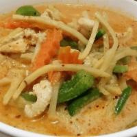 Red Curry · Blended of dry roasted Thai chilies, herbs, bamboo shoots, carrots, green beans, sweet basil...